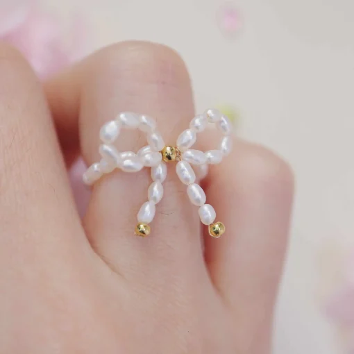 Charming Pearl Bow Promise Ring with Golden Accents