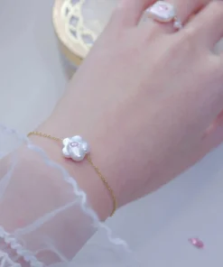 Elegant Single Pearl Bracelet with Blossom Design and Pink Gem